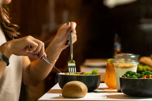 6. Eat at Local Mealtimes and Keep Your Meals Light