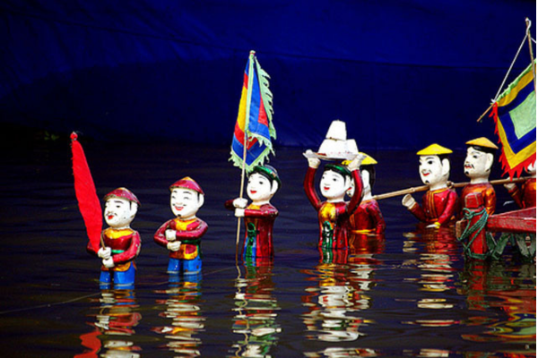 (Catch a water puppet show - things to do in Hanoi)