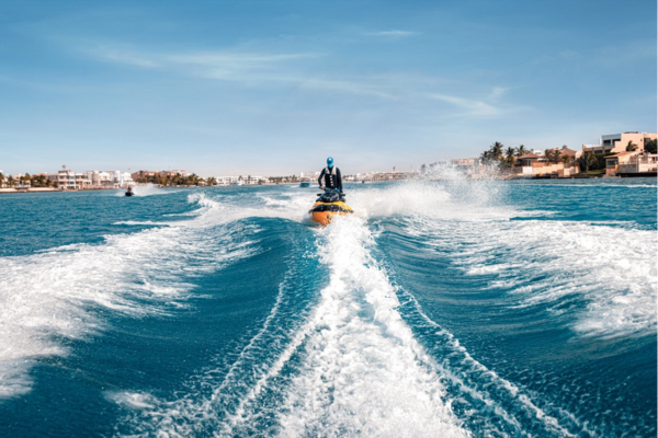 A tourist jet skiing at Saudi Arabian sea.
