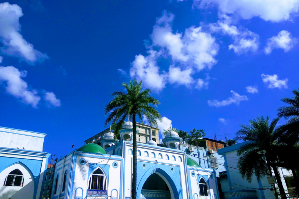 Shah Jalal Dargah under a beautiful blue sky. (credits: localguidesconnect)