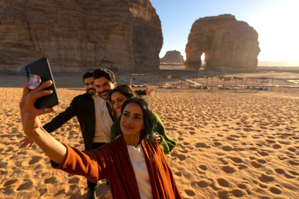 Travellers in Saudi Arabia wearing casual western clothes.